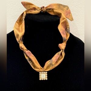 Gold and Cream pendant on scarf Necklace
